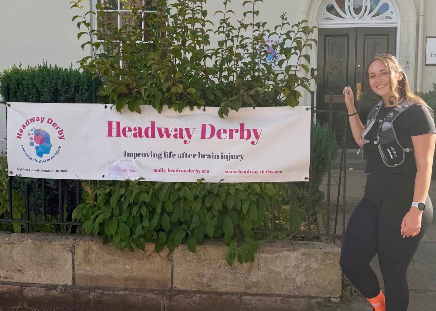 Amelia outside her chosen charity, Headway Derby