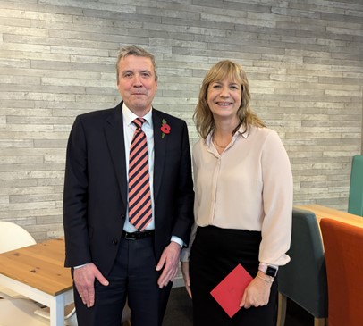 Andy Oldroyd presenting gifts to Rachel Bromham for her long service