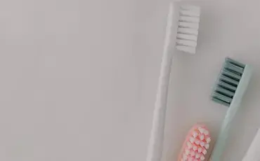 Tooth brushes on a white background.