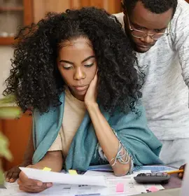 couple-looking-at-the-bills