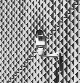 security-camera-on-patterned-building