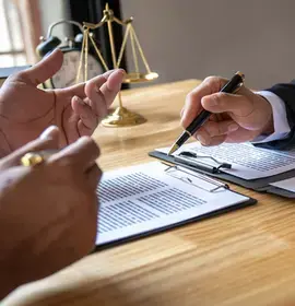 Solicitor and Client Discussing Terms of a Contract