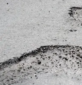 Public Road with Potholes