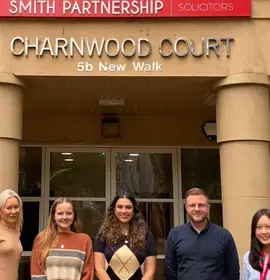 Della, Abbie, Erina, Michael and Enrika posing in front of Leicester office