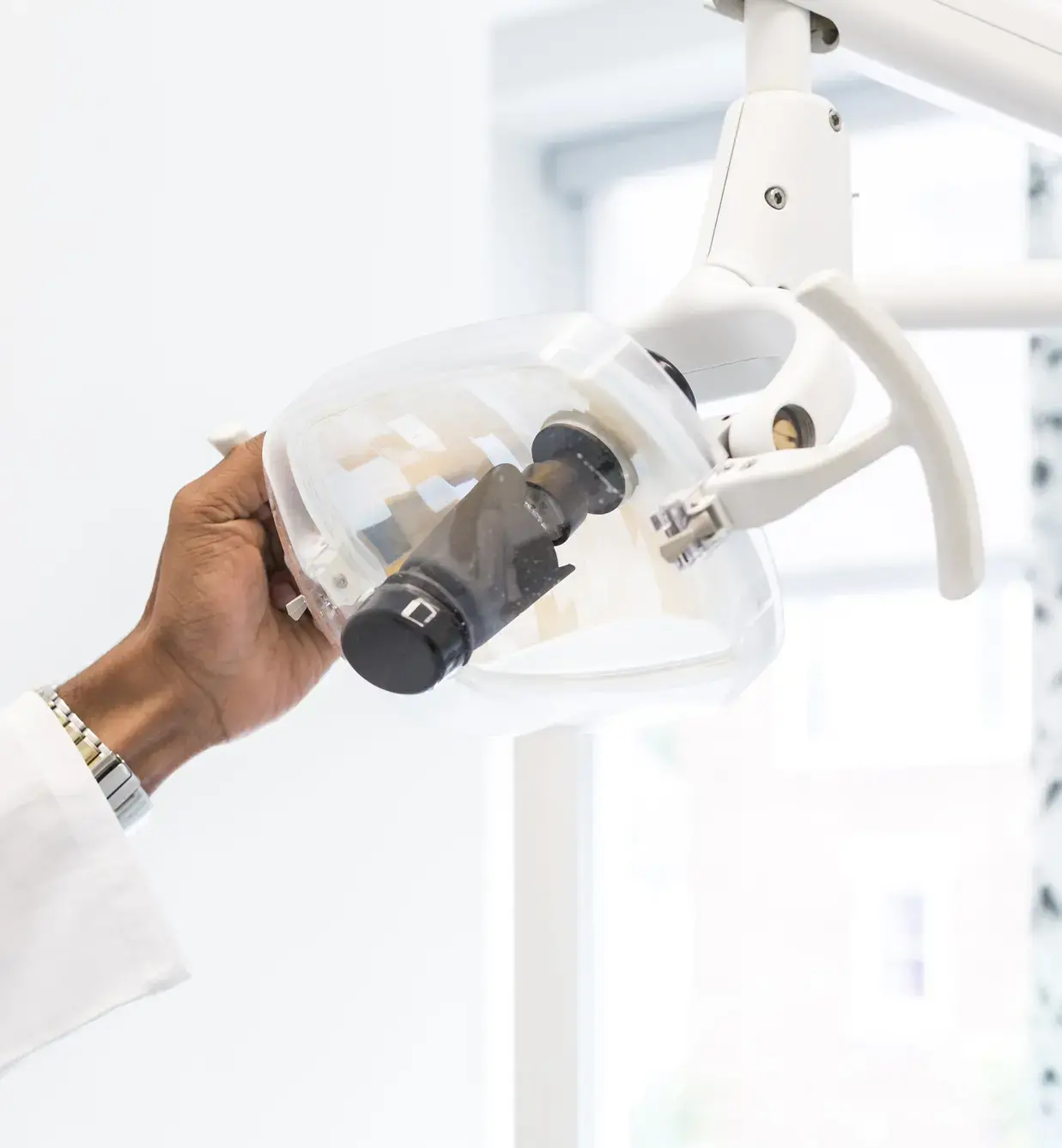 Dentist using Dental Examination Light