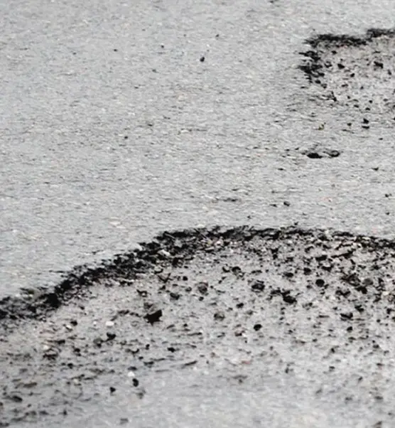 Public Road with Potholes