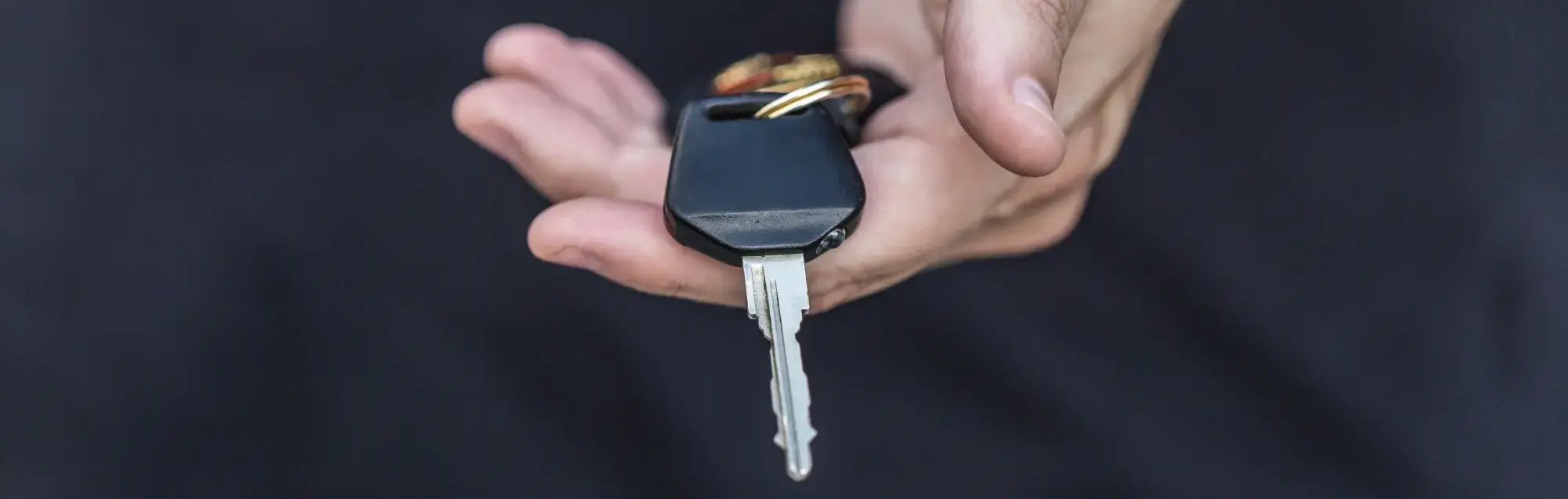 Person holding car keys