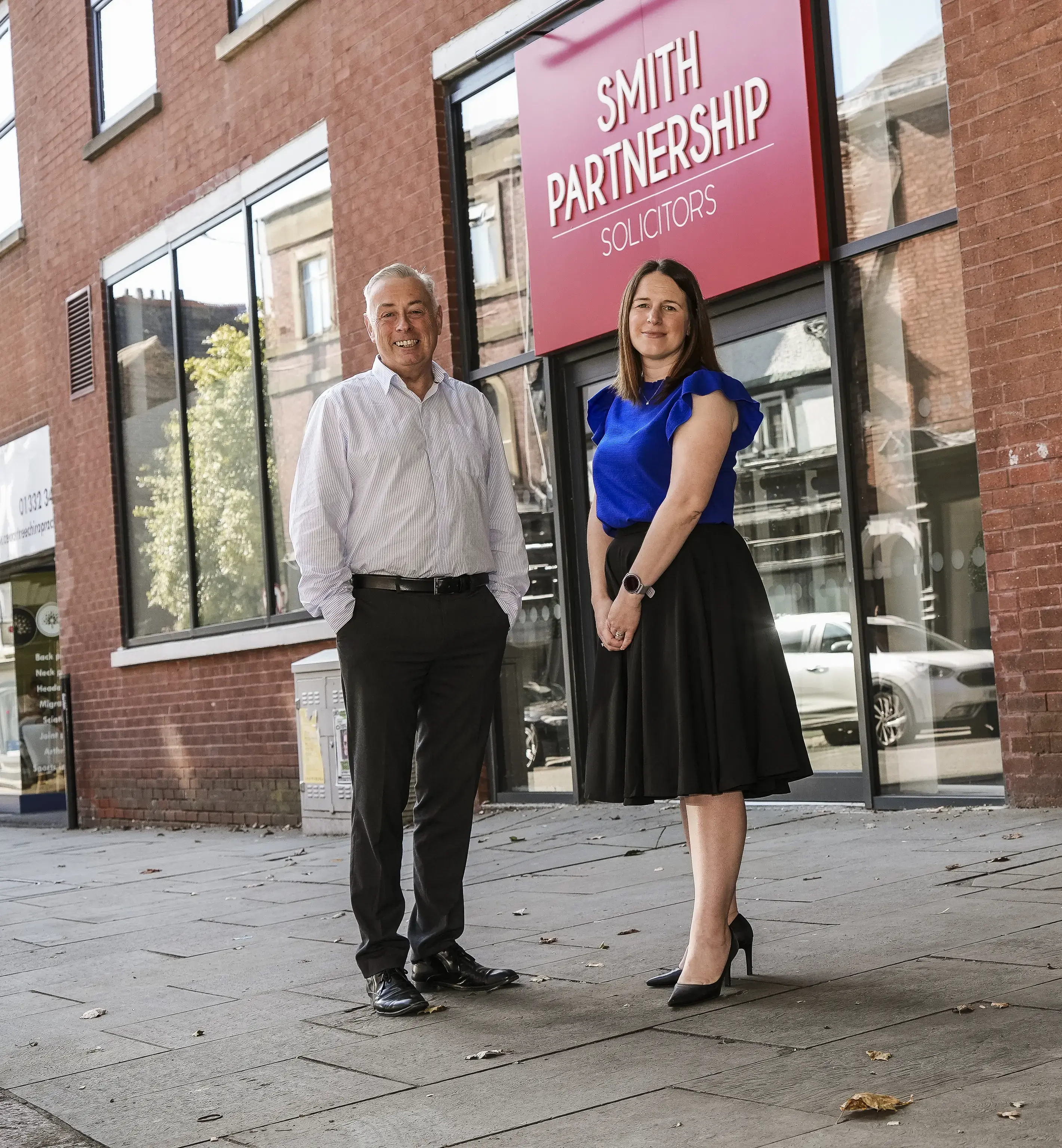 Pictured: Kevin McGrath with Sarah Reader, on Friar Gate in front of Smith Partnership’s head office