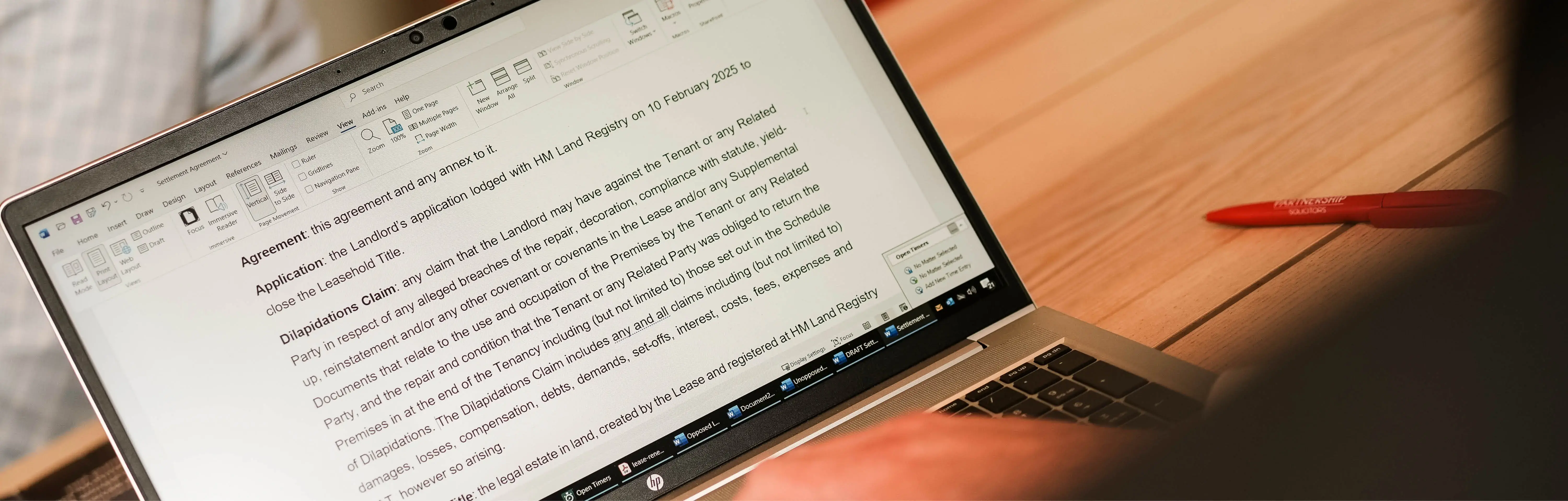 A Laptop Displaying Legal Contracts