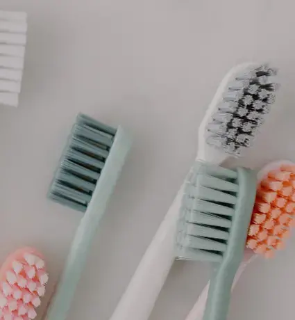 Tooth brushes on a white background.