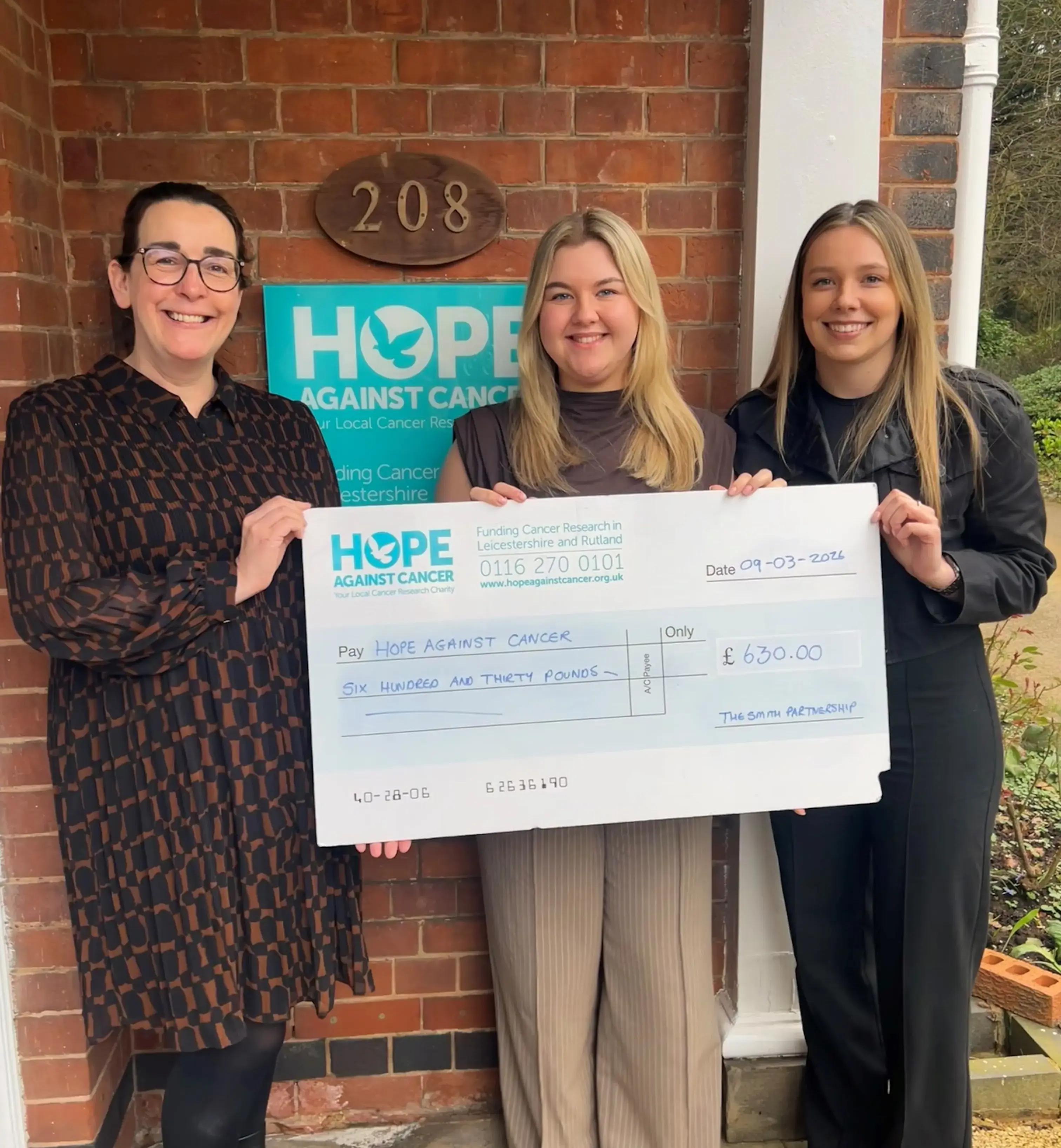 Charity donation - cheque photo.