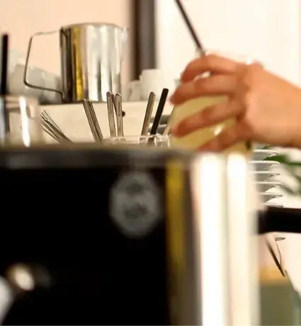 Employee clearing glasses
