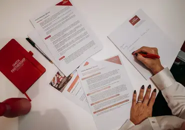Mediator taking notes in a mediation session 